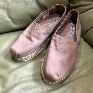 Bob’s brand slip on flats with thick sole and a row of jute.